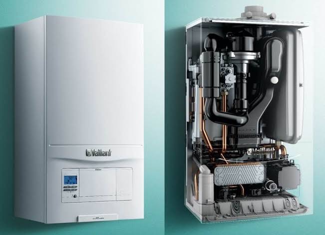 Warm family living room heated by a modern efficient Vaillant central heating system on a winter evening